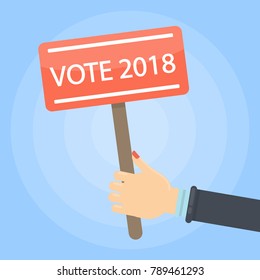 Vote 2018 sign in hand. Presidential election in Russia.