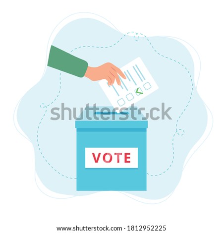 Vote ballot box. A hand putting a vote into the box. Election concept.