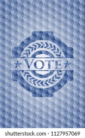 Vote blue emblem with geometric pattern.