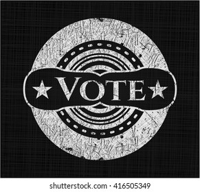 Vote chalk emblem written on a blackboard