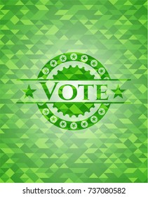 Vote green emblem. Mosaic background