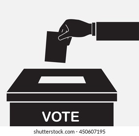 Voting concept. Hand putting paper in the ballot box 