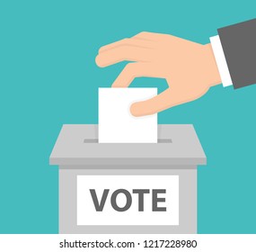 Voting concept. Hand putting white paper into the ballot box