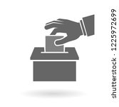 Voting, suggestion or feedback icon concept. Hand putting paper into the box