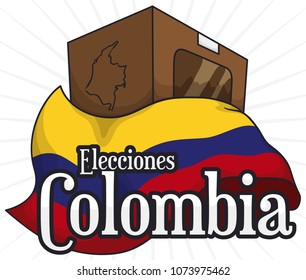 Voting urn in paperboard and map with Colombian flag ready for national elections (written in Spanish).