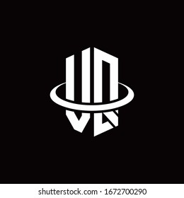 Logotipo de monograma en forma de hexágono y rodeado por un anillo
