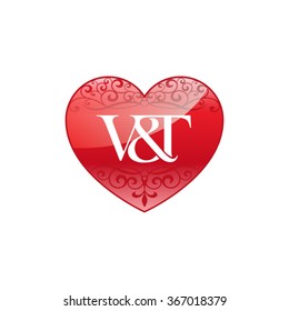 V&T initial letter logo with ornament heart shape