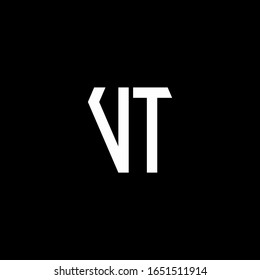 Monograma abstracto del logotipo VT aislado en fondo negro