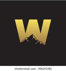 W alphabet mountain negative space letter logo gold black background