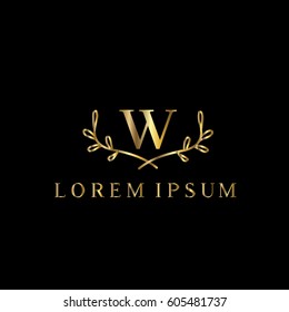 W letter golden branches vector logo design template