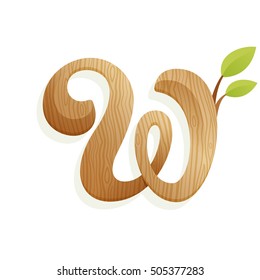 W letter logo with wood texture and green leaves. Vector elements for ecology poster, t-shirts and cards.