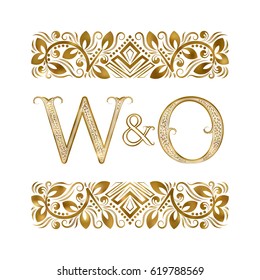 W and O vintage initials logo symbol. The letters are surrounded by ornamental elements. Wedding or business partners monogram in royal style.