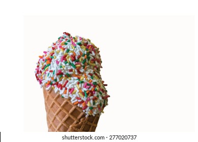 A waffle cone with large scoops of ice cream and colorful sprinkles.