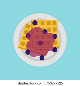 Waffle topped with blueberry sauce