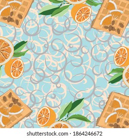 Waffles decorados con naranjas de fondo azul