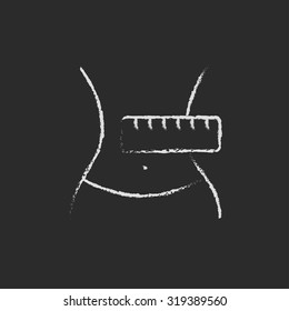 Waist with measuring tape hand drawn in chalk on a blackboard vector white icon isolated on a black background.