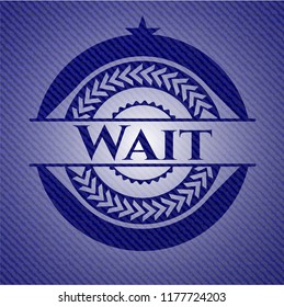 Wait emblem with denim high quality background