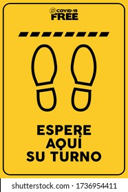 Wait here for your turn written in Spanish. Covid-19 free zone poster. Signs for shops, stores, hairdressers, establishments, bars, restaurants ...