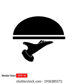 Waiter with food tray vector icon in black solid flat design icon isolated on white background