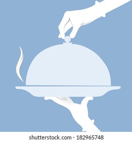 Waiter holding empty tray over a blue background