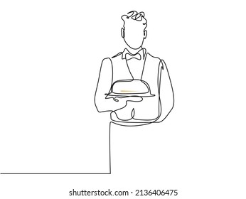 Waiter in a luxuriously dressed luxury restaurant presents the service with a reaction lantern in his hand
