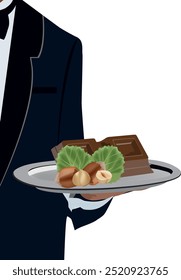 Waiter in a tuxedo is holding a tray with chocolate and hazelnuts