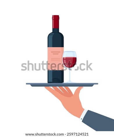 Waiters hand holding wine bottle and glass on the tray.