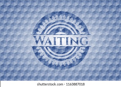 Waiting blue hexagon emblem.