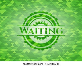 Waiting green emblem with triangle mosaic background