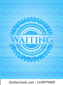 Waiting light blue water emblem.