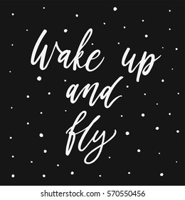 Wake up and fly. Hand drawn script. Brush modern calligraphy on black background with circles. Vector lettering for posters, card design.