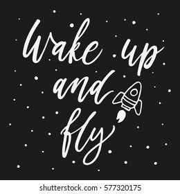 Wake up and fly typography with rocket illustration. Hand drawn lettering. Modern brush calligraphy. Hand drawn vector script. Motivational quote phrase for card or poster.