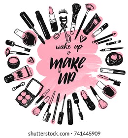 Wake up and make up brush lettering on pink art brush stroke background with cosmetics collection