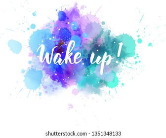 Wake up! - handwritten modern calligraphy lettering phrase on watercolor imitation color splash. 