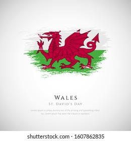 Wales flag made in brush stroke background. st. david's day day of Wales. Creative Wales national country flag icon. Abstract painted grunge style brush flag background.