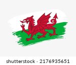 Wales flag made in textured brush stroke. Patriotic country flag on white background