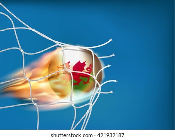 Wales flag on soccer ball goes through the net of goal in vector format, design for score in football with powerful shooting as a fire