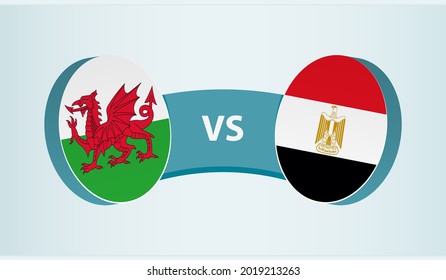 Wales versus Egypt, team sports competition concept. Round flag of countries.