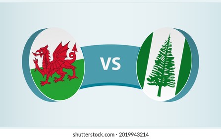 Wales versus Norfolk Island, team sports competition concept. Round flag of countries.
