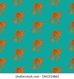 Walking cheetah in orange and black on turquoise green background. Designed in vector seamless repeat pattern, ready to be printed on fabric, wallpaper or wrapping paper.