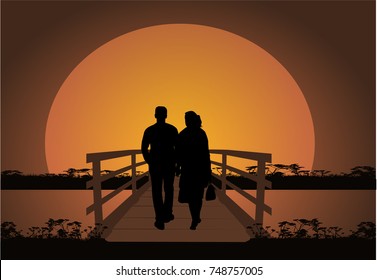 Walking couple in the evening.