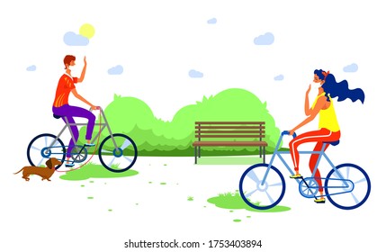 Walking in the park on a bicycle after the quarantine. Walking the dog. Greeting to the rider. Two masked men ride a bicycle. Abstract background of nature.