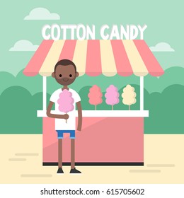 Walking in the park. Young black man eating a cotton candy / editable flat vector illustration