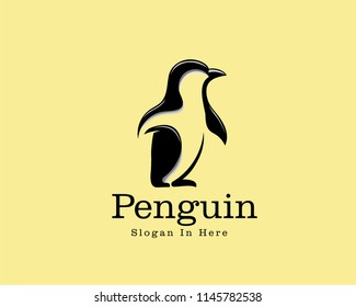 walking penguin animal logo vector