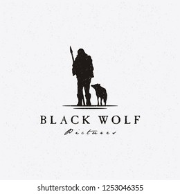 Walking Polar Hunter bring a spear with Wolf Silhouette Vintage Rustic Hand drawn Logo design