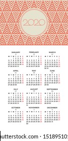 Wall Calendar 2020 with decorative winter holidays pattern. Vector design template. Week starts on Monday.