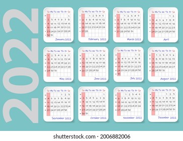 Wall calendar for 2022 year on the green background.
