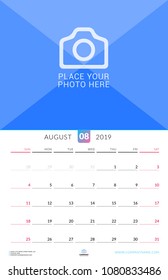 Wall calendar for August 2019. Vector design print template with place for photo. Week starts on Sunday. Portrait orientation