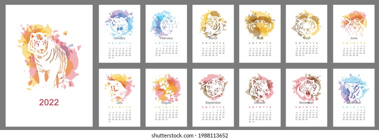 Wall calendar design template for 2022, the year of the tiger in the chinese or oriental calendar. Week starts on Sunday. Set of 12 pages with the image of the tiger. Vector illustration.