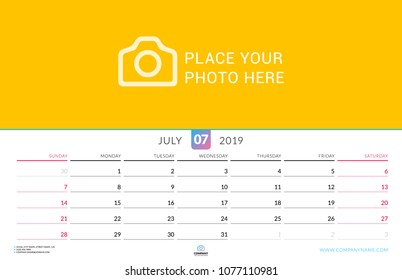 Wall calendar for July 2019. Vector design print template with place for photo. Week starts on Sunday. Landscape orientation